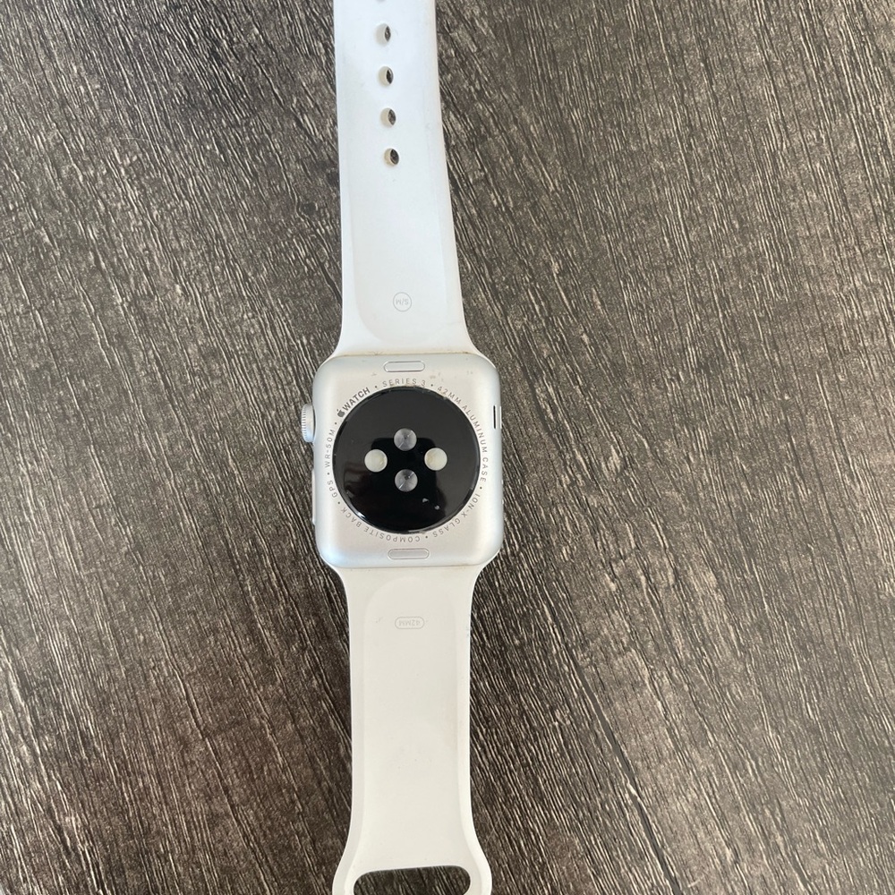 Apple Watch Series 3 42mm (included band and charging station)